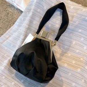 Evening bag beautiful black satin inside purple . NWT.